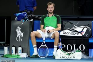 Danii Medvedev hits his racket on the floor as Jannik Sinner wins the Australian Open after fighting back from two sets down to beat Daniil Medvedev in thrilling final at Rod Laver Arena