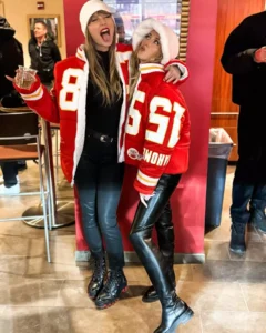 Taylor Swift and Brittany Mahomes Root for Their Guys in Matching Custom Coats at Chiefs-Dolphins Game